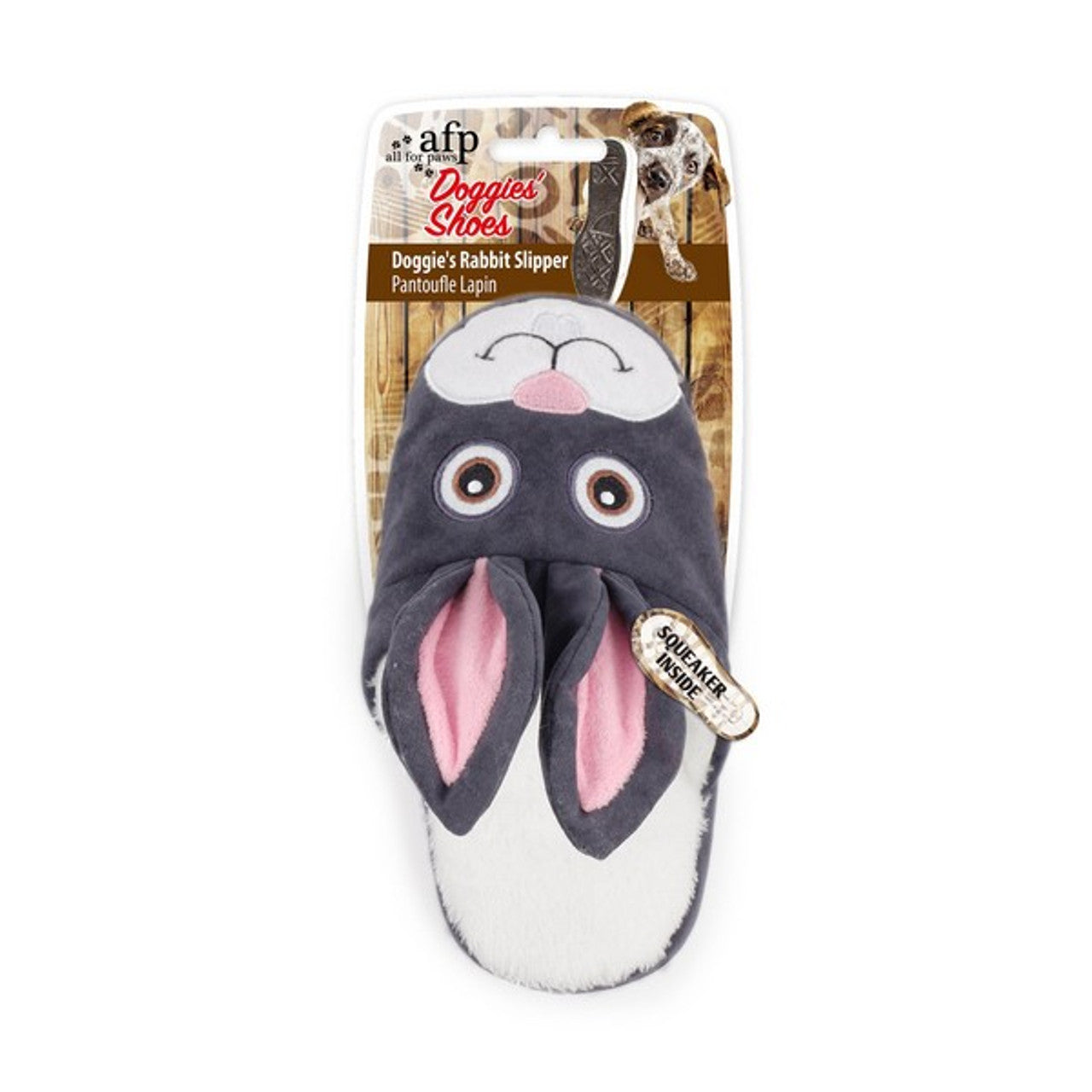 A soft rabbit slipper toy for dogs