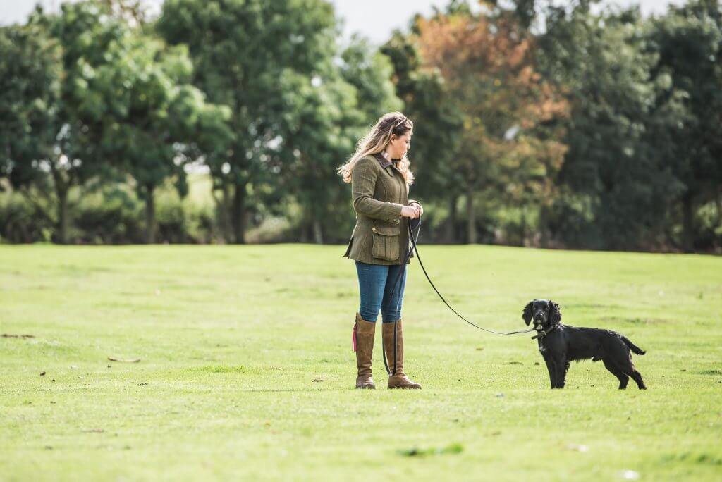 Dog and owner using the black long lead for training